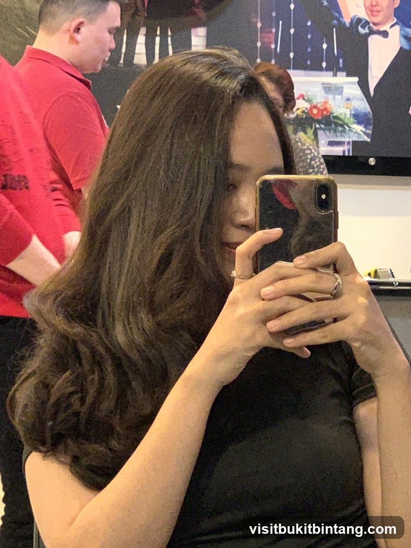 Woman taking a selfie in a salon