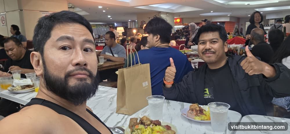 Two men enjoying a meal