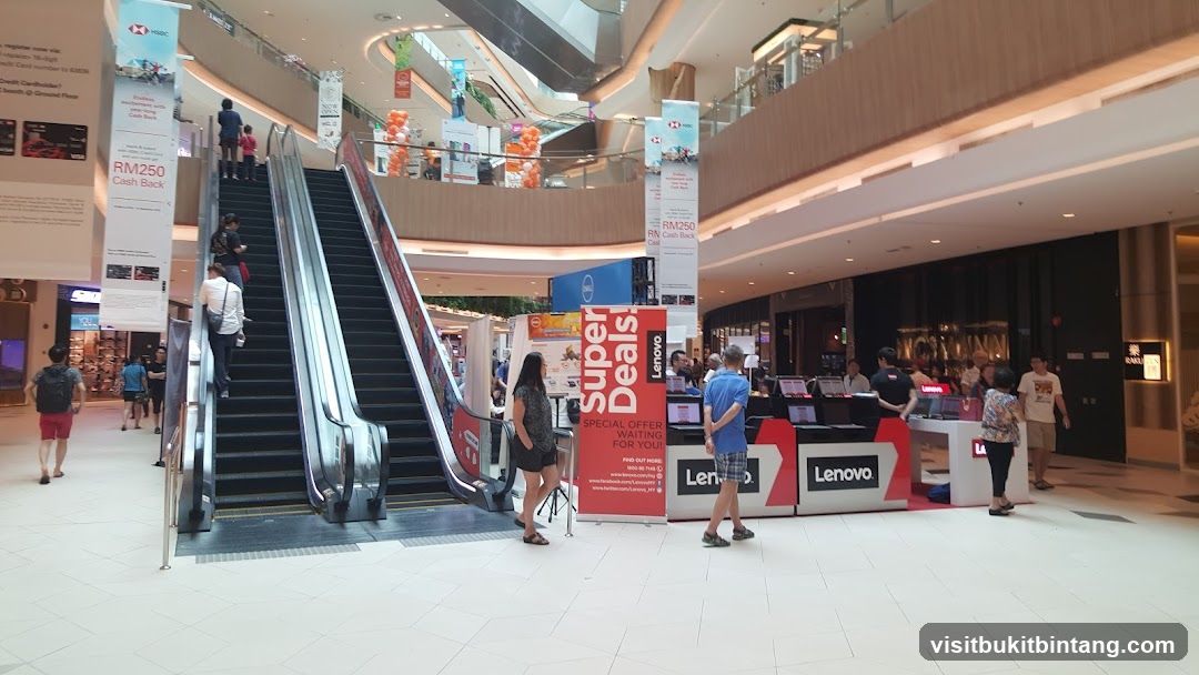 Mall Interior with Escalators and Lenovo Promotion