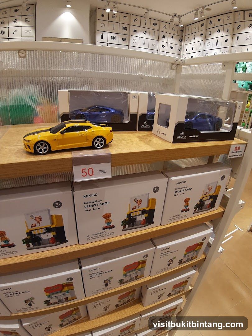 Toy cars and building block sets on display