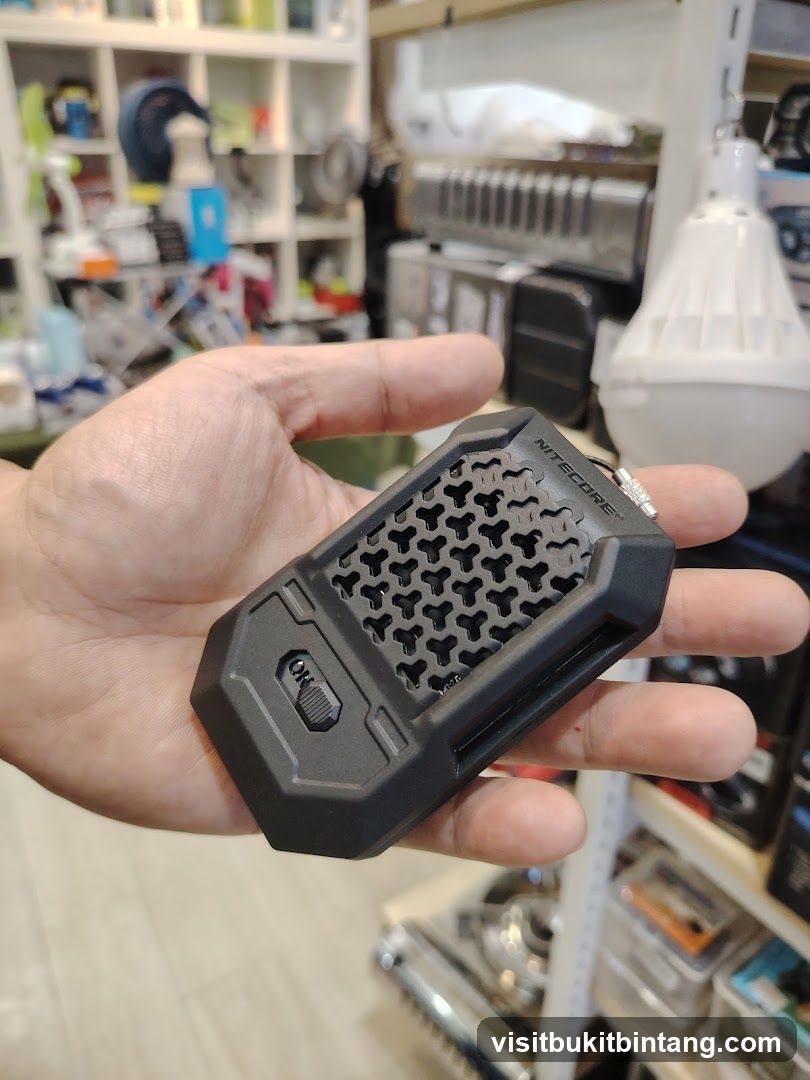 Nitecore device held in hand