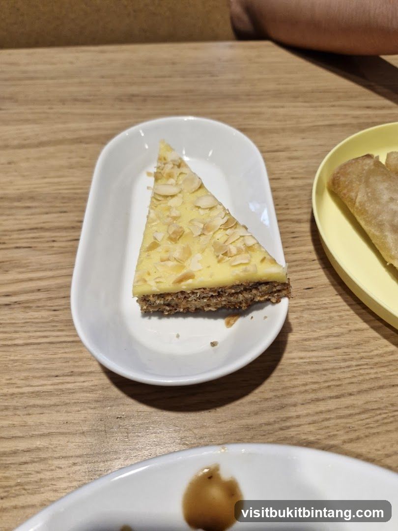 Slice of cake with almonds