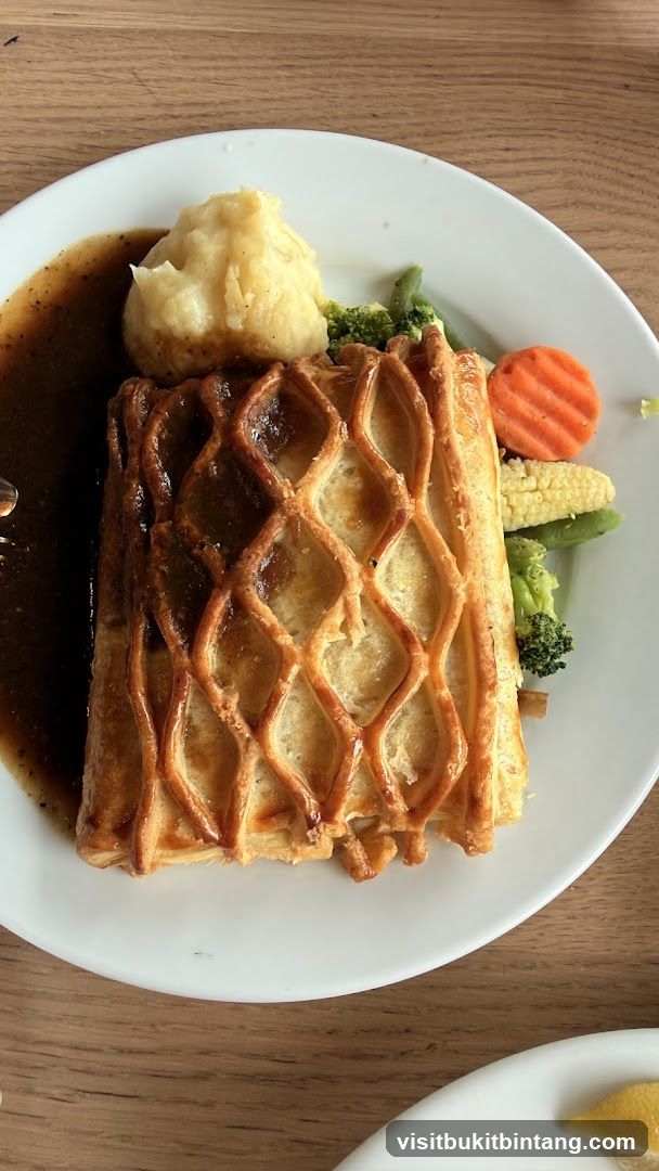 Beef Wellington with Mashed Potatoes and Vegetables
