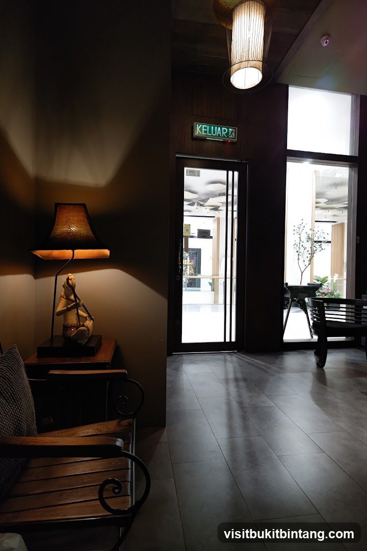 Interior hallway with seating and exit sign