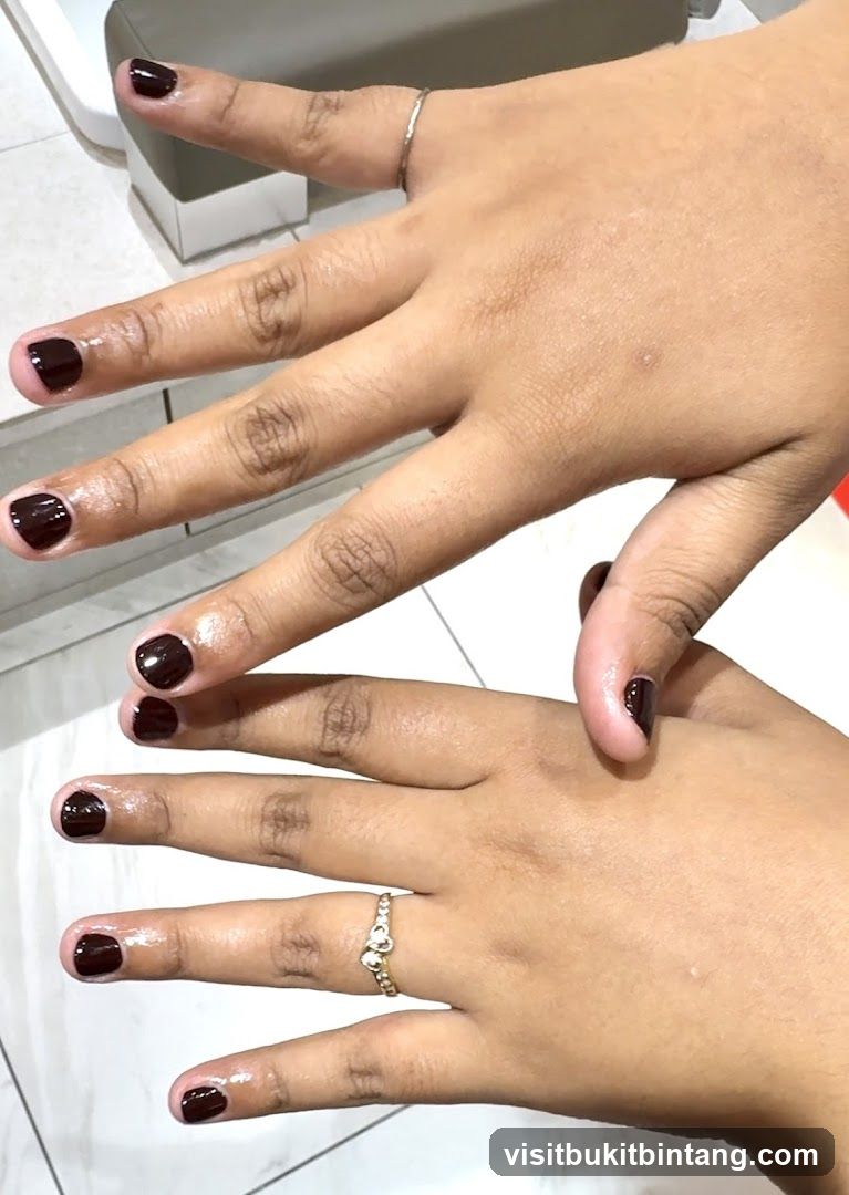 Hands with Dark Red Nail Polish