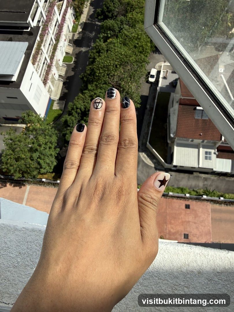 Hand with decorated nails