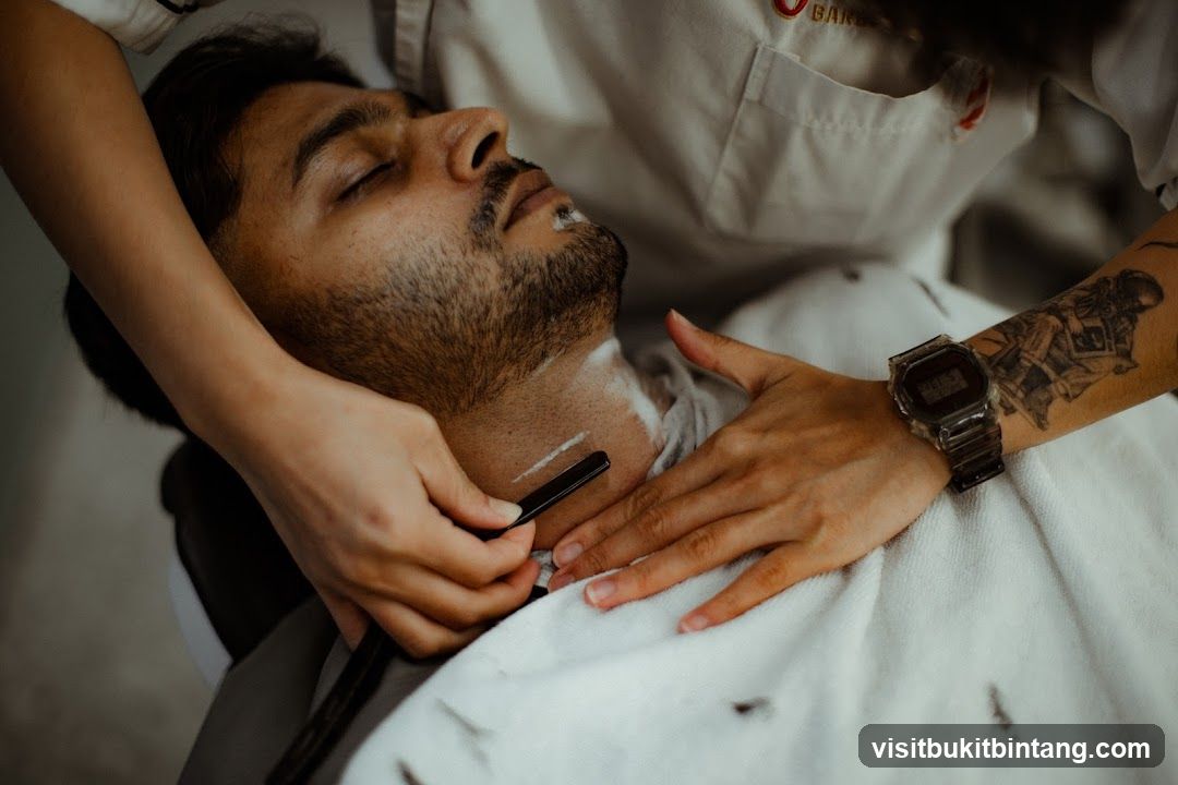 Barber Shaving a Client