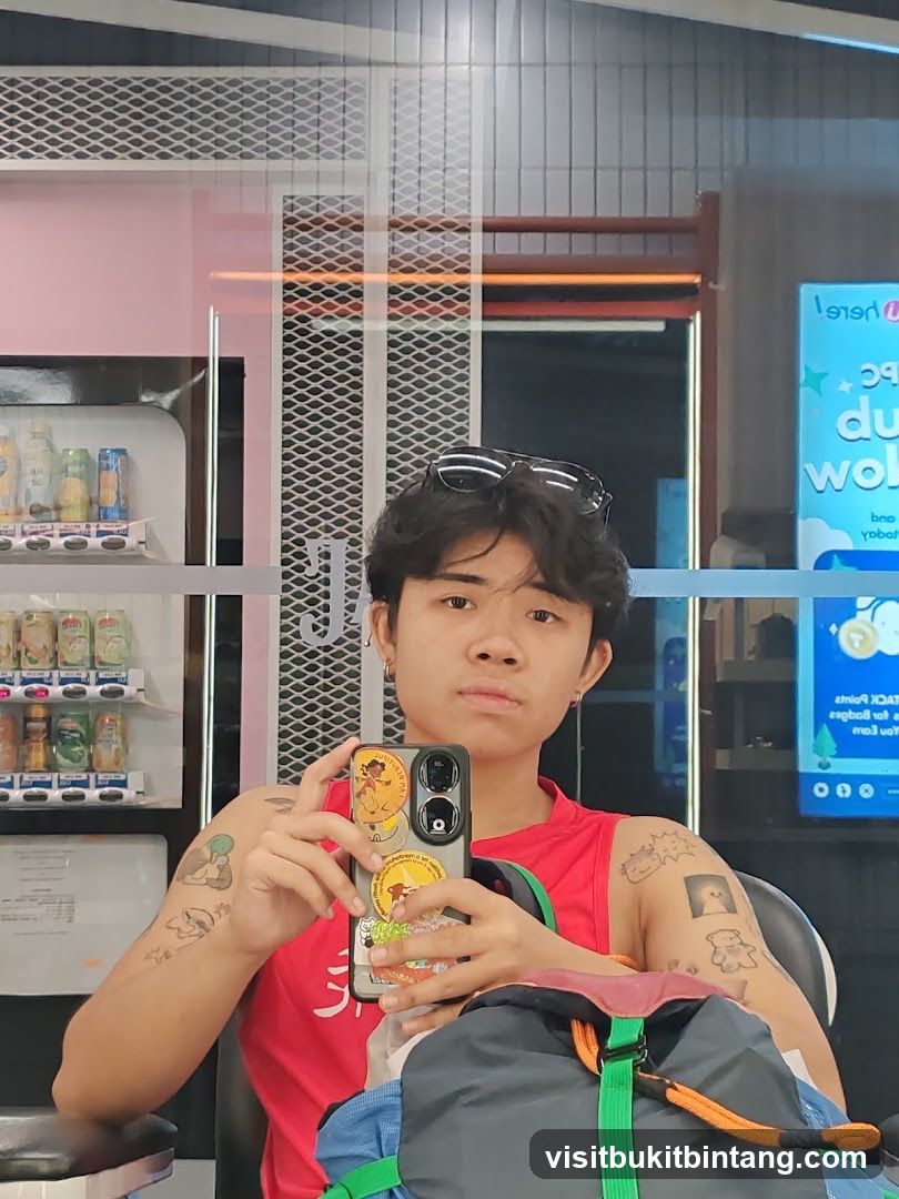 Person taking a selfie in a salon