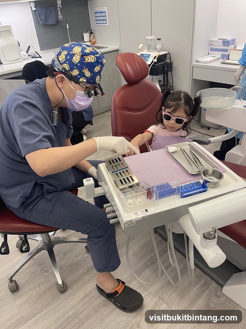 Dentist with young patient
