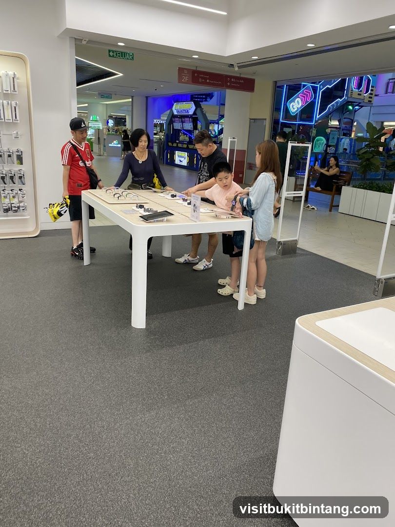 People looking at display table in store