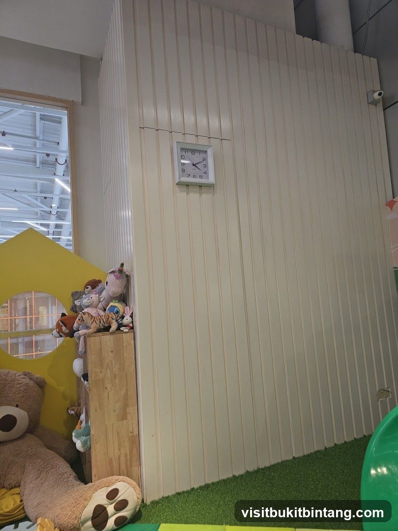 Play area with stuffed animals and clock