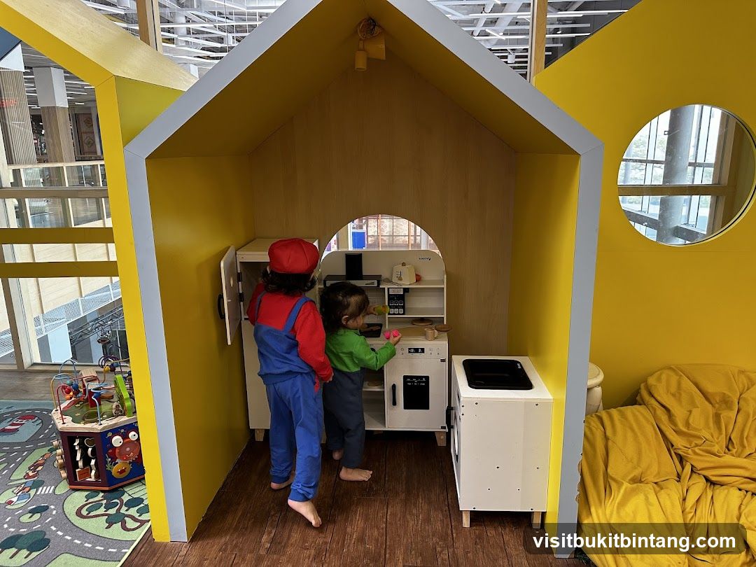 Children Playing in a Play Kitchen