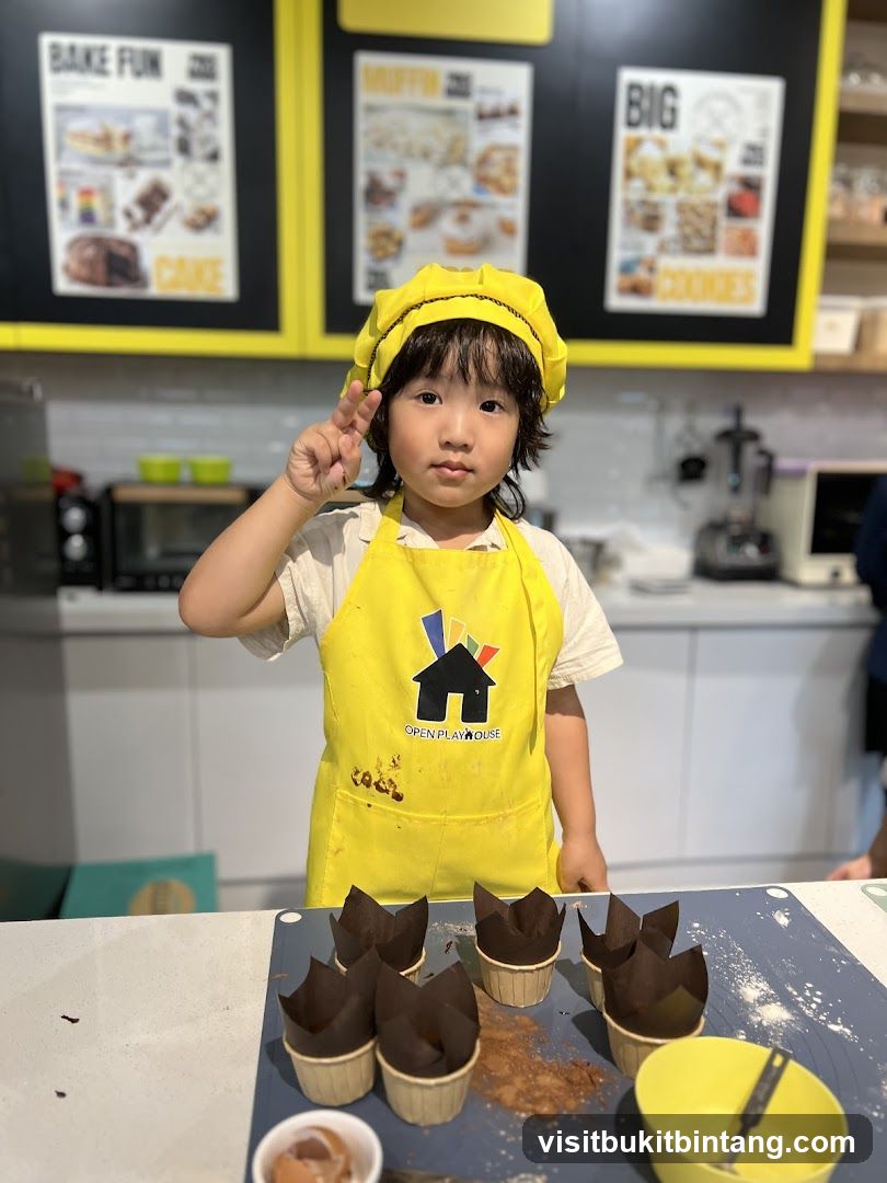 Young Chef with Cupcakes