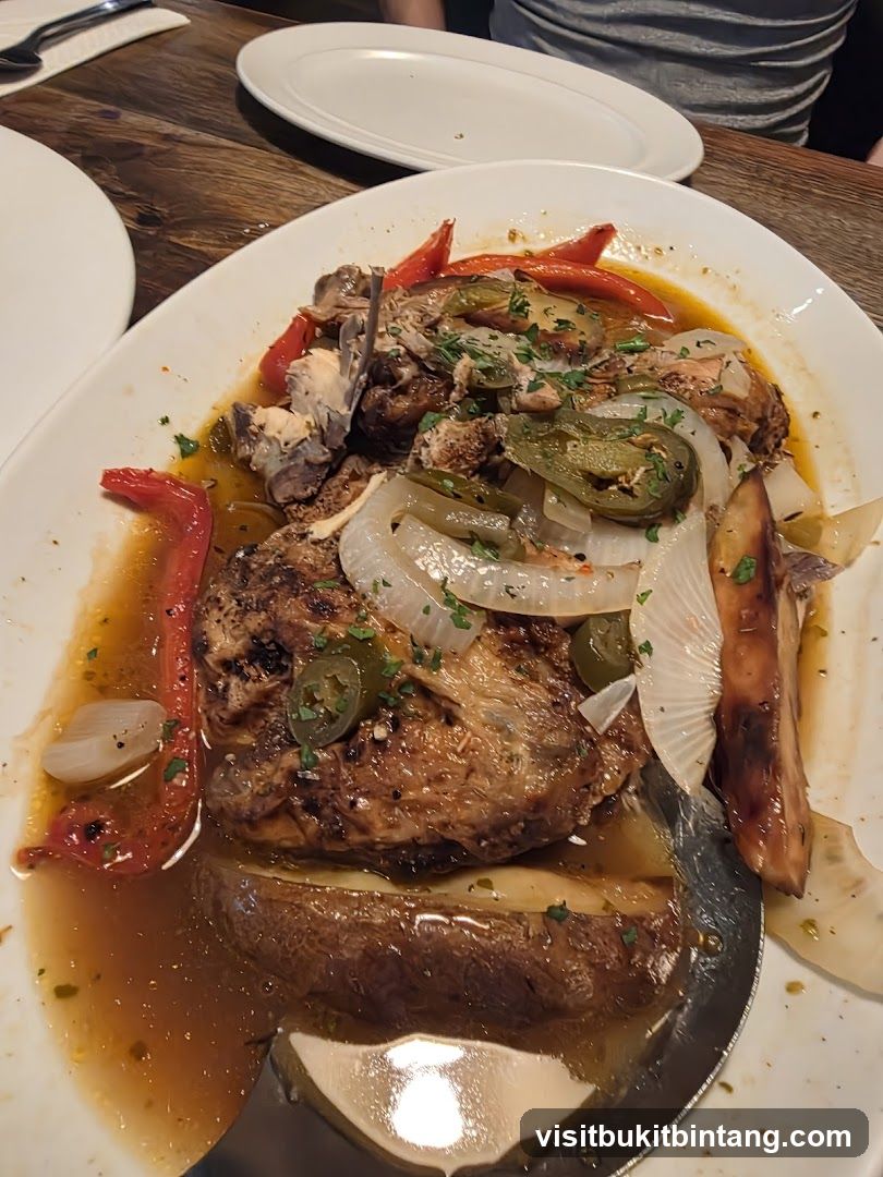 Chicken dish with peppers and onions