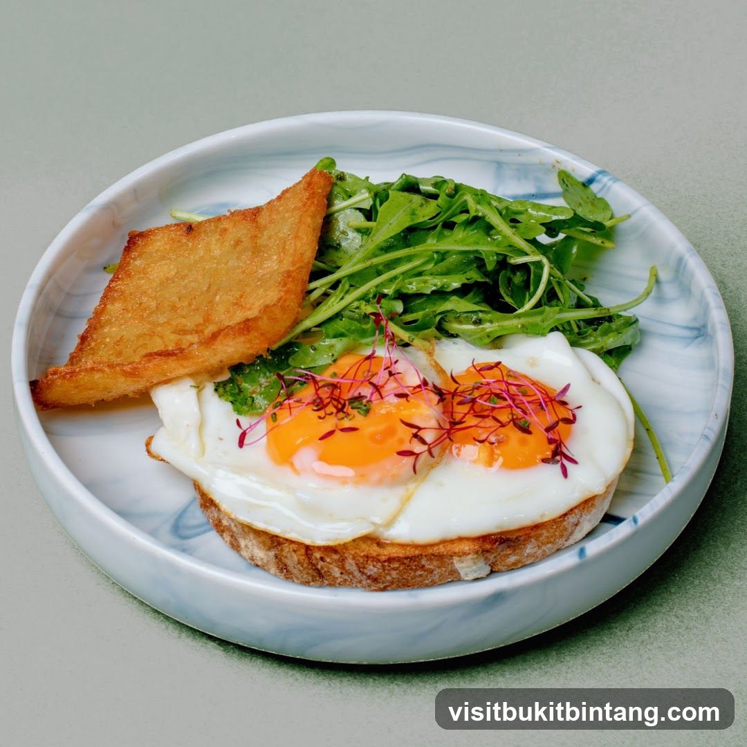 Fried Eggs on Toast with Greens