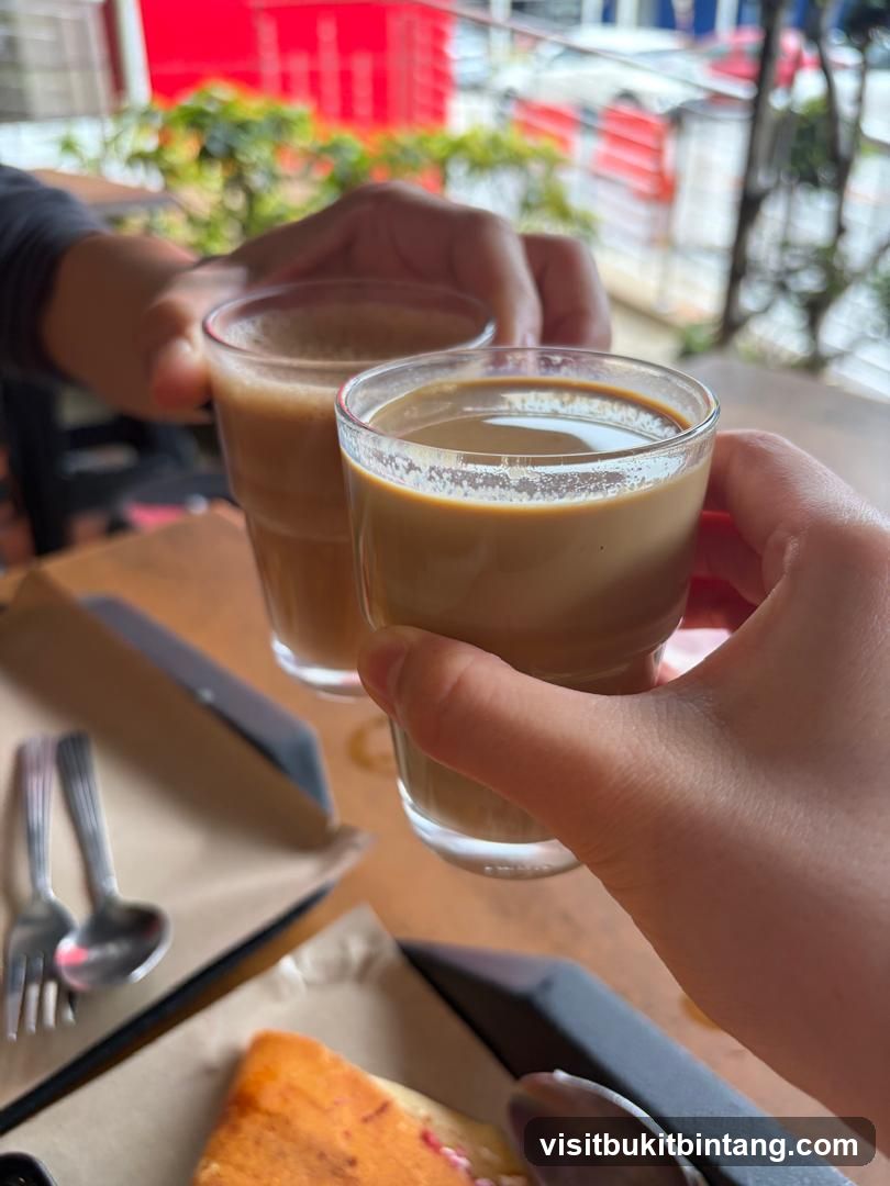 Two people toasting with coffee