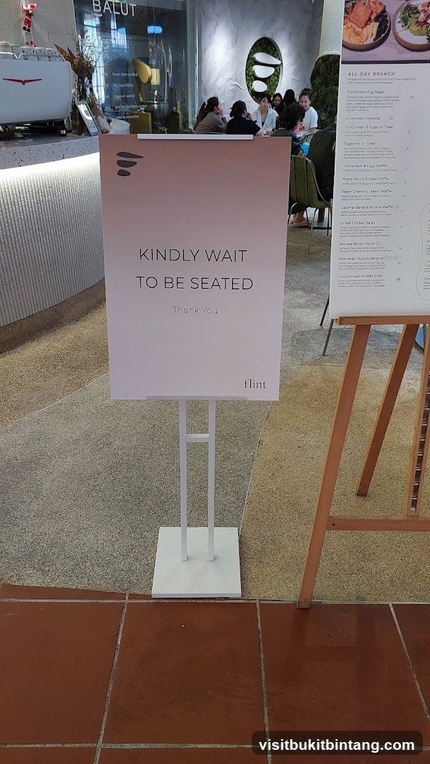 Flint Wait to Be Seated Sign