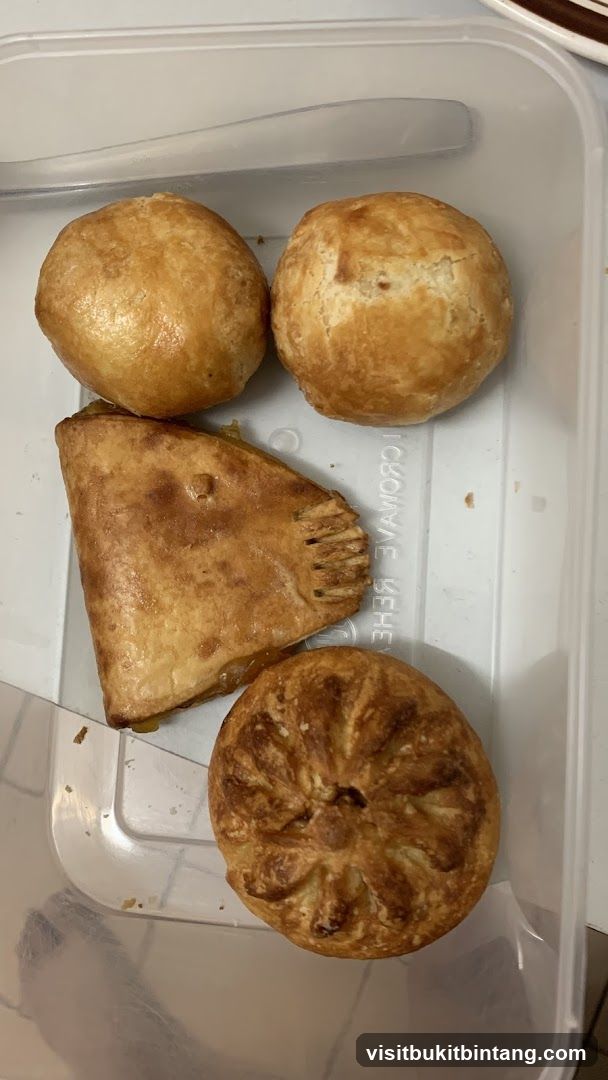 Four Pastries in a Container
