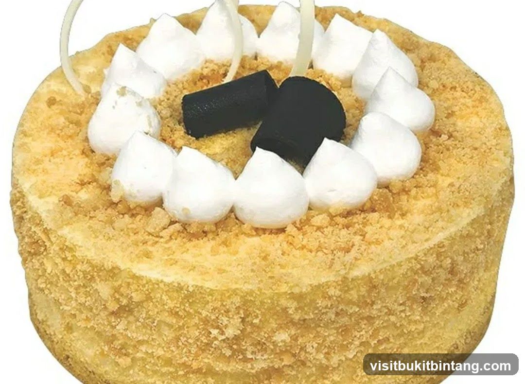 Cake with White Frosting and Chocolate Decorations