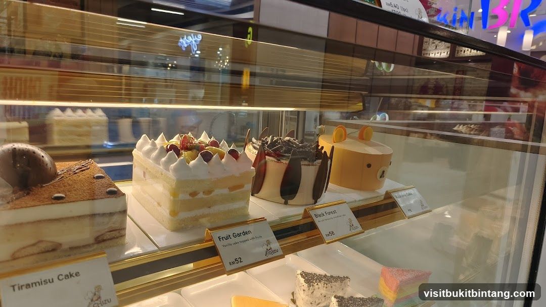 Cakes in a display case
