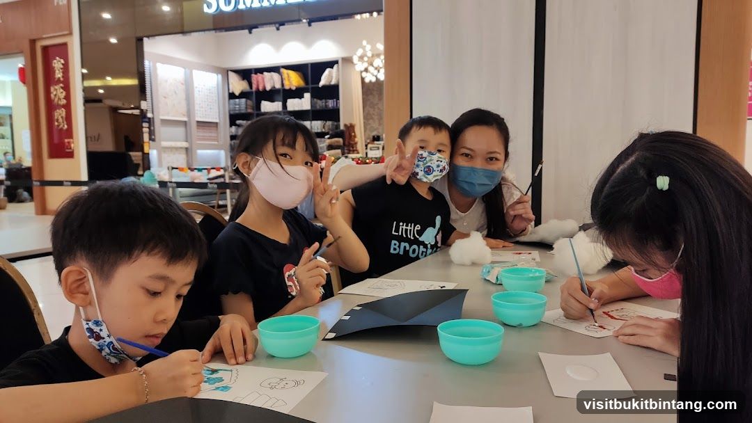 Children and adult painting