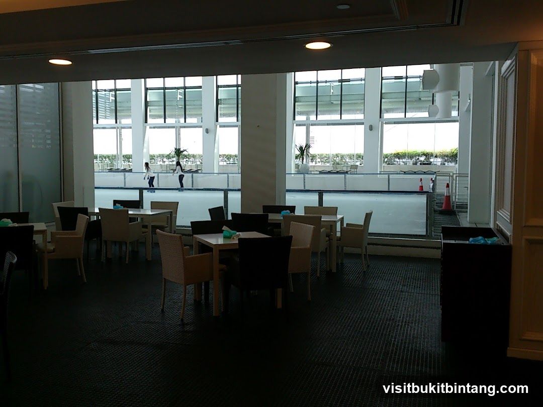 Indoor Seating Area Overlooking Ice Rink