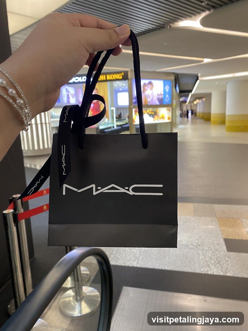 MAC Shopping Bag in Airport Terminal