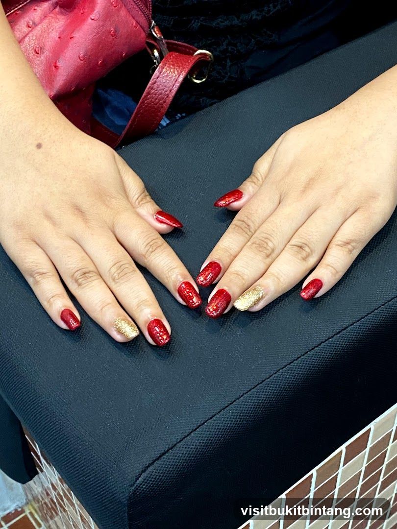 Sparkling Red and Gold Nails
