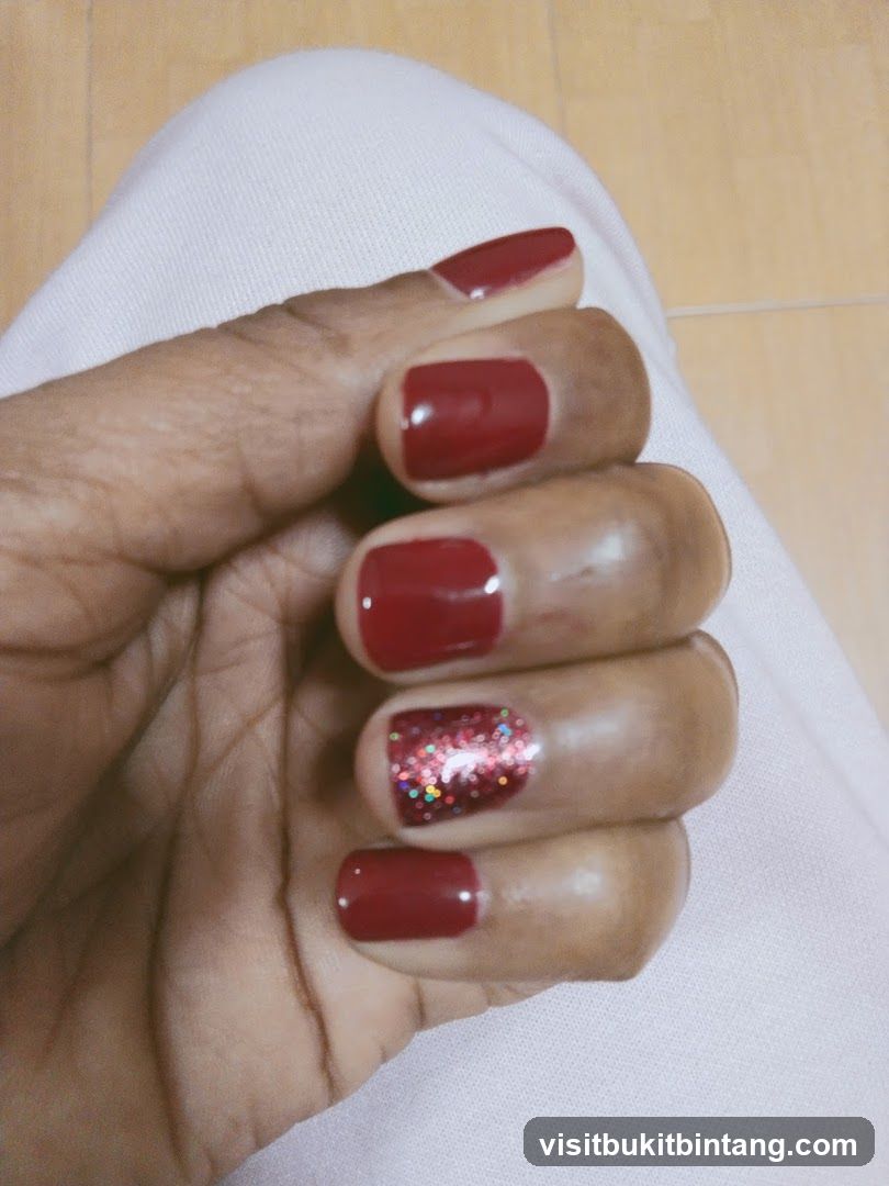 Red Nails with Glitter Accent