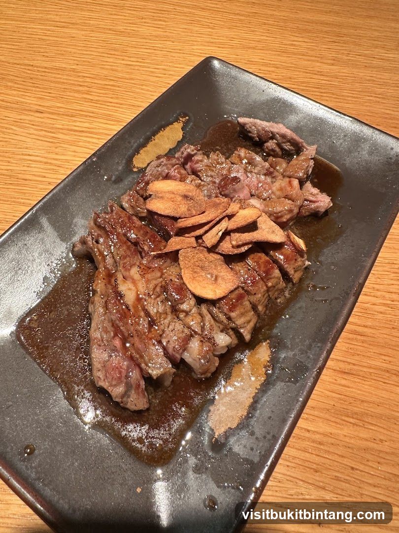 Sliced Steak with Crispy Garlic