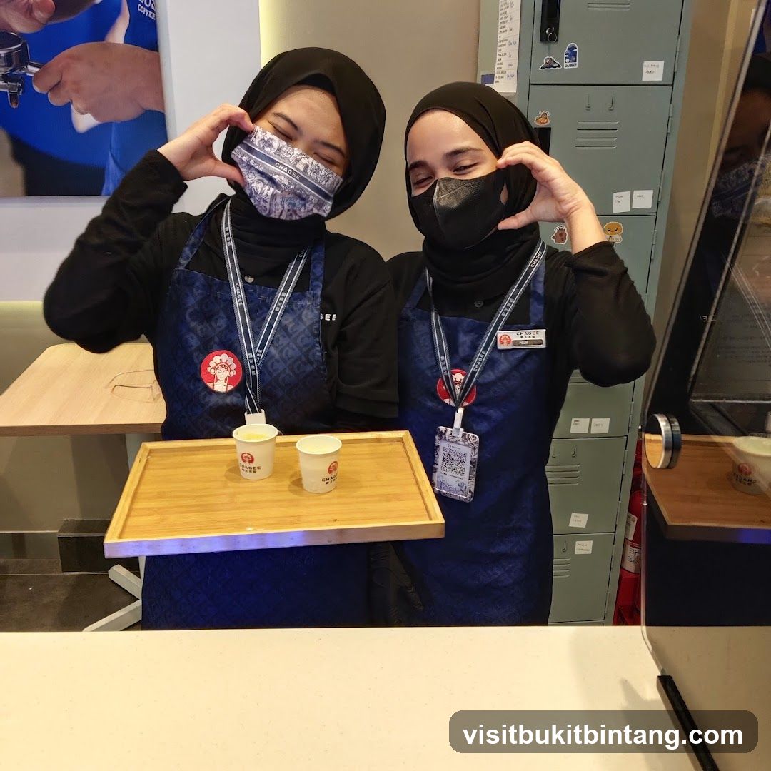 Two Baristas Offering Samples