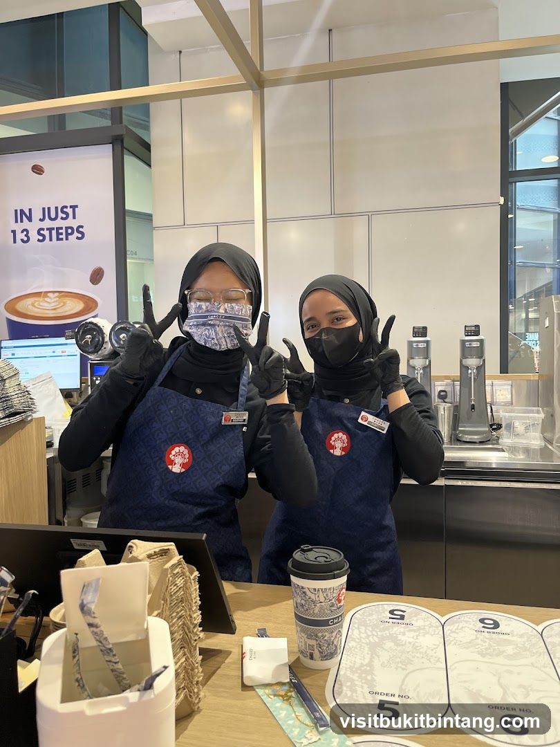 Baristas Posing at Counter