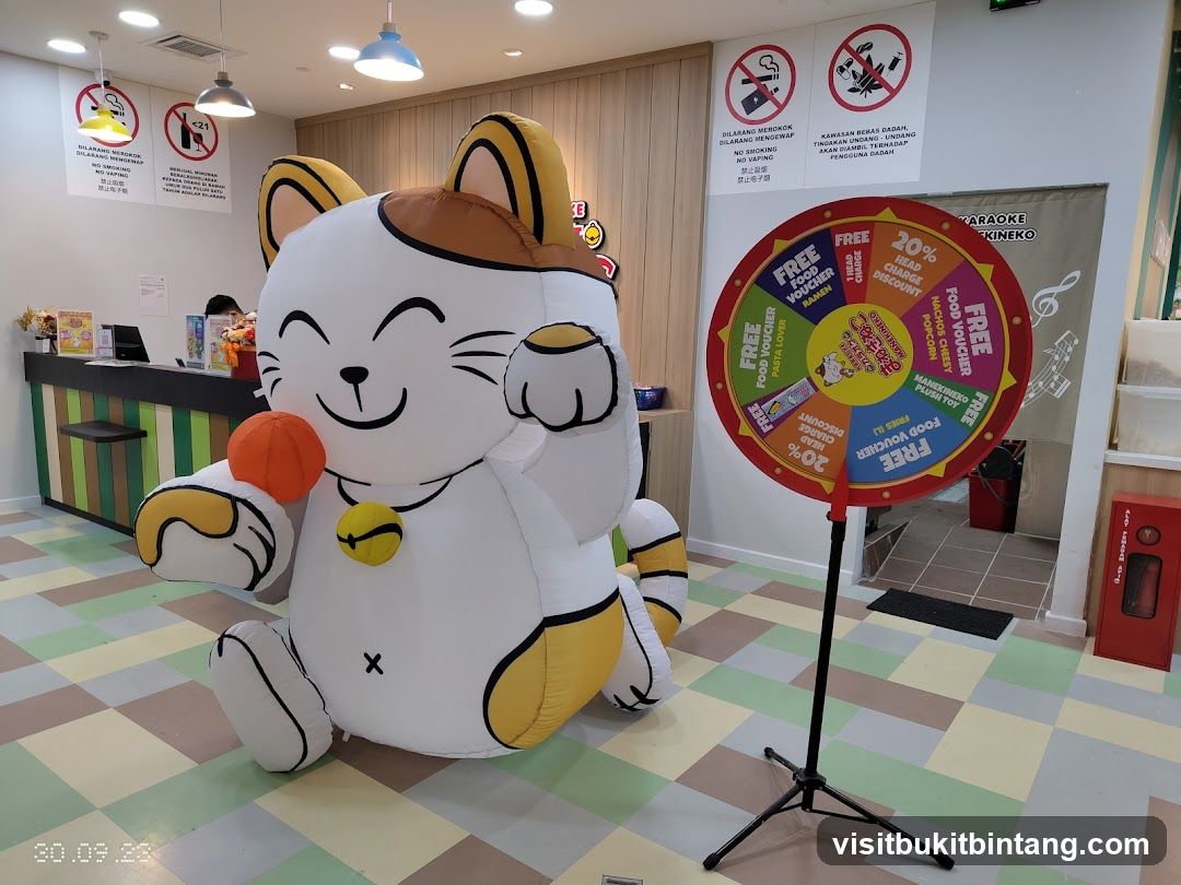 Inflatable Cat Mascot and Prize Wheel