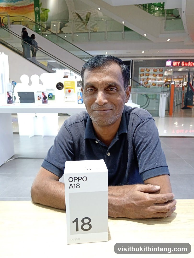 Man with OPPO A18 box