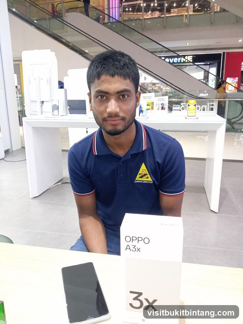 Man with OPPO A3x box
