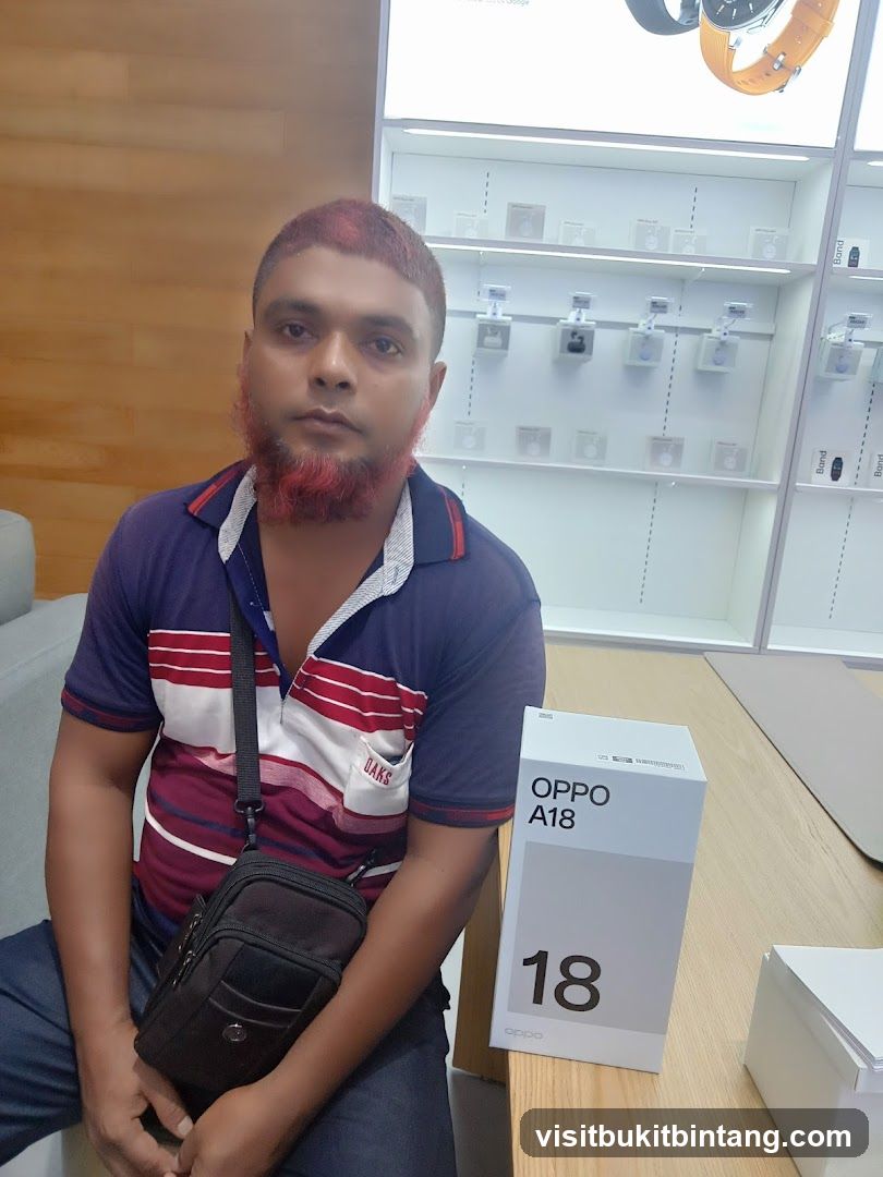 Man with OPPO A18 box