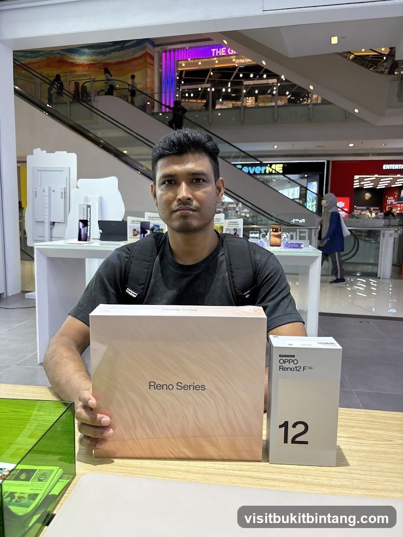 Man with OPPO Reno Series Box