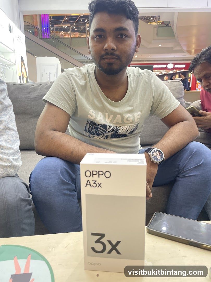 Man with OPPO A3x box
