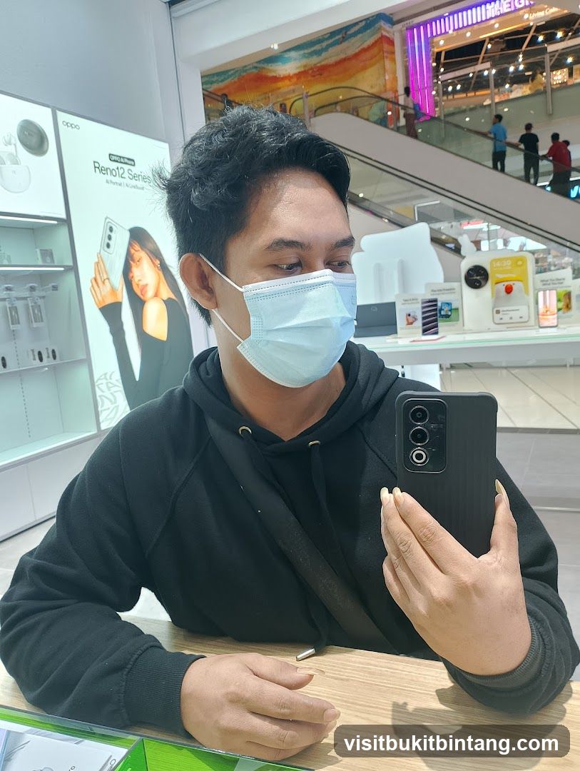 Man taking a selfie in a store