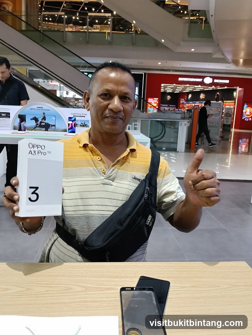 Man holding an Oppo phone box