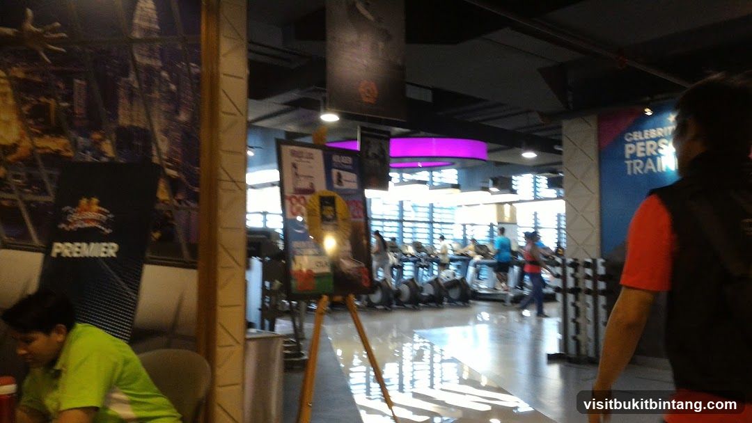Gym Interior with Treadmills and Promotional Display