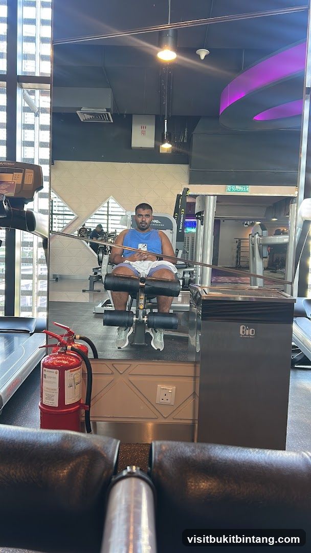 Man on gym equipment