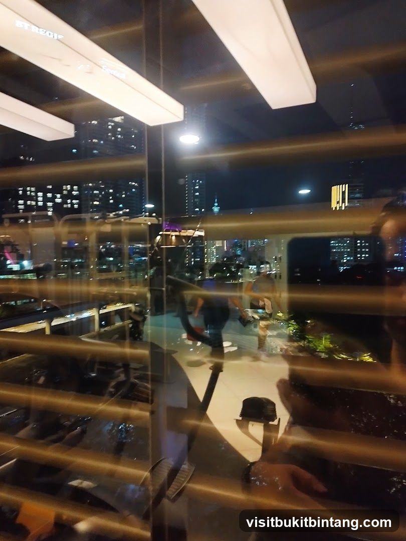 Interior view of a restaurant with city lights at night