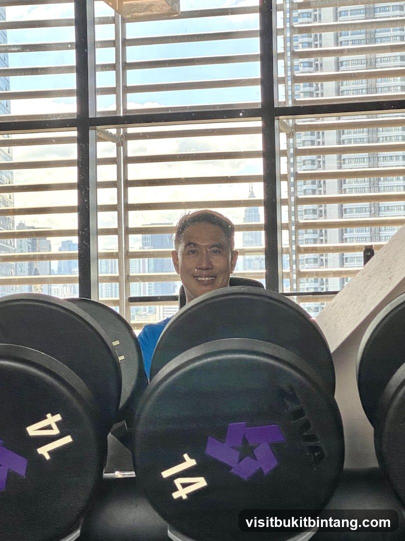 Man in Gym with Dumbbells