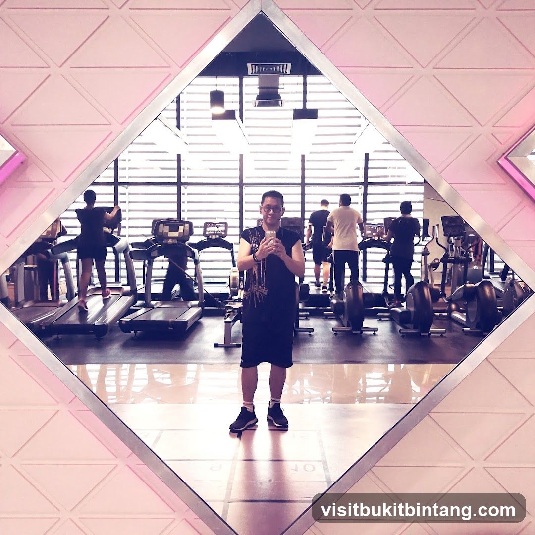Gym Interior with People Exercising