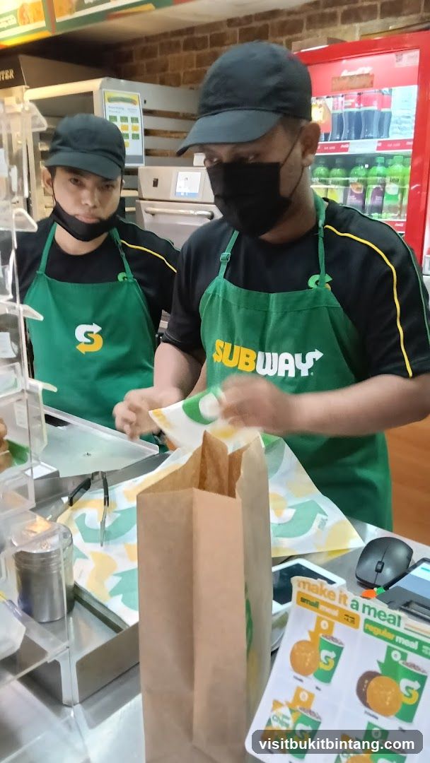 Subway Employees Preparing Order