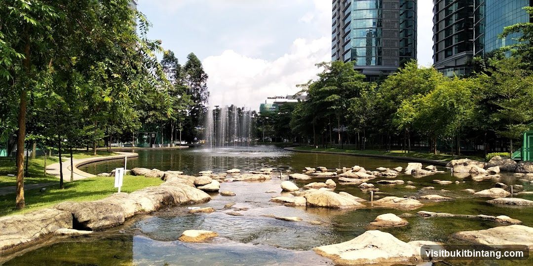 Park with Fountain and Skyscrapers