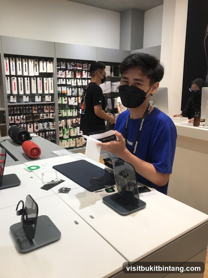 Store employee assisting customer