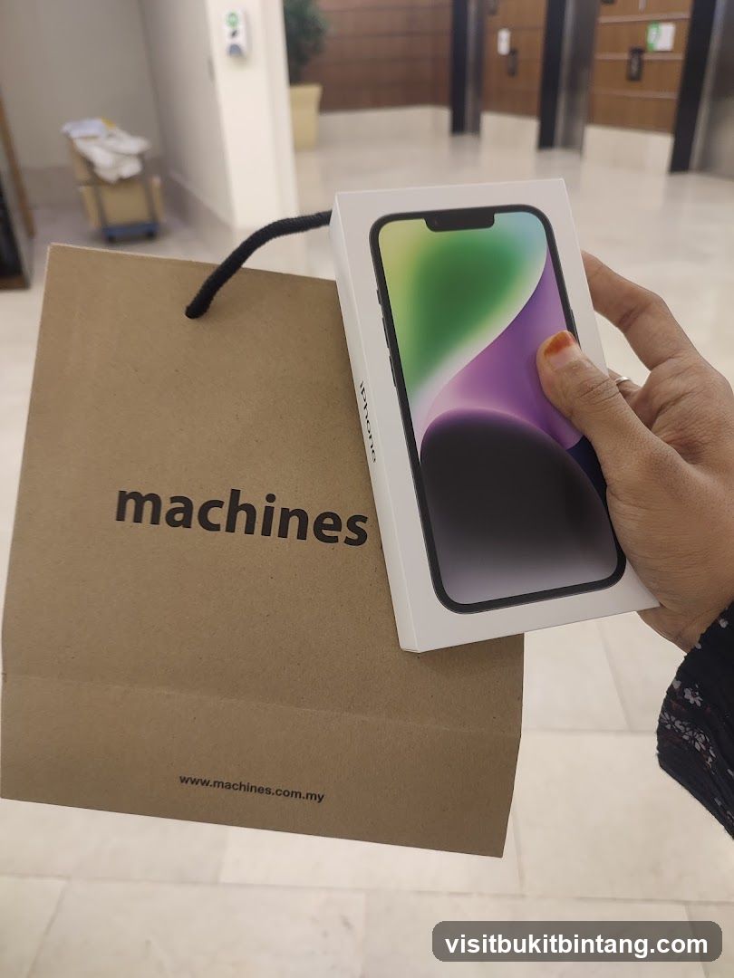 iPhone 14 Pro box and shopping bag