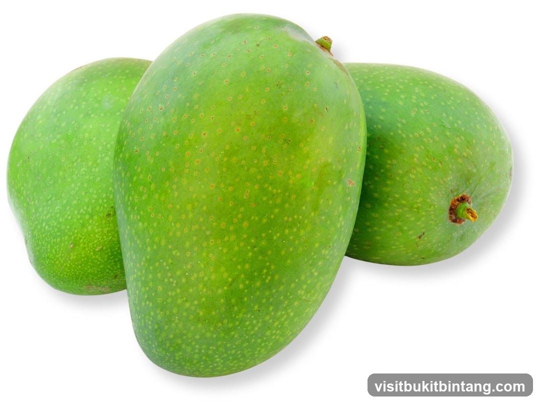 Three green mangoes